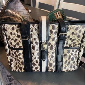 Gwen Stefani L.A.M.B. over the shoulder hand bag.